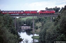 Northbound train at the bridge over Billstaån near Hackås